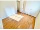 Bedroom featuring hardwood floors, closet, and lots of natural light at 3372 Wayward Ct, Las Vegas, NV 89129