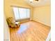 Cozy bedroom with hardwood floors and a large window for natural light at 3372 Wayward Ct, Las Vegas, NV 89129
