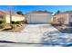 Charming single-story home with a well-maintained front yard and a two-car garage at 3372 Wayward Ct, Las Vegas, NV 89129