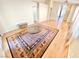 Spacious living area with hardwood floors and a stylish area rug, perfect for gatherings at 3372 Wayward Ct, Las Vegas, NV 89129