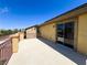Spacious balcony with stylish railings overlooking neighborhood, accessible through sliding glass doors at 3412 Catherine Mermet Ave, North Las Vegas, NV 89081