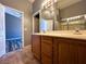 Bathroom with double sinks and a shower over bath, providing a comfortable space at 3412 Catherine Mermet Ave, North Las Vegas, NV 89081
