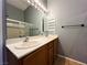 Bright bathroom with double sinks, spacious counter, and a shower-tub combination at 3412 Catherine Mermet Ave, North Las Vegas, NV 89081