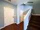 Foyer with hardwood floors, gray walls, white trim, and staircase to the second level at 3412 Catherine Mermet Ave, North Las Vegas, NV 89081