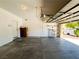 Spacious garage with storage shelves, door to interior, and room for storage at 3412 Catherine Mermet Ave, North Las Vegas, NV 89081