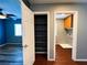 View of a hallway leading to a bedroom, closet, and laundry room at 3412 Catherine Mermet Ave, North Las Vegas, NV 89081