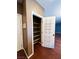 View of the pantry with shelving on both sides of the wall at 3412 Catherine Mermet Ave, North Las Vegas, NV 89081