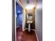 Compact powder room features a pedestal sink, decorative mirror, and modern lighting at 3412 Catherine Mermet Ave, North Las Vegas, NV 89081
