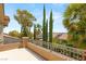 Balcony showcasing landscaped backyard, neighborhood views, and blue skies at 3535 Coventry Gardens Dr, Las Vegas, NV 89135