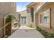 Open courtyard with a fireplace and view of the home's exterior at 3535 Coventry Gardens Dr, Las Vegas, NV 89135