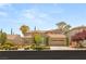 Charming single-Gathering home featuring a well-manicured lawn and a spacious two-car garage at 3535 Coventry Gardens Dr, Las Vegas, NV 89135