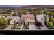 Aerial view of a well-landscaped suburban home at twilight at 3535 Coventry Gardens Dr, Las Vegas, NV 89135