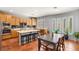 Spacious eat-in kitchen with stainless steel appliances, center island, and ample seating at 3535 Coventry Gardens Dr, Las Vegas, NV 89135