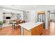 Open kitchen featuring an island, stainless steel appliances, and a breakfast bar at 3535 Coventry Gardens Dr, Las Vegas, NV 89135
