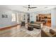 Open-concept living area with hardwood floors and plenty of natural light at 3535 Coventry Gardens Dr, Las Vegas, NV 89135