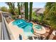 An aerial view of the pool, spa, and yard, showing the beautiful landscaping and well-designed outdoor space at 3535 Coventry Gardens Dr, Las Vegas, NV 89135
