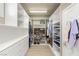 Large walk-in closet with shelving and storage drawers at 3535 Coventry Gardens Dr, Las Vegas, NV 89135