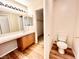 This bathroom has matching cabinets, countertop, and toilet at 3542 Harbor Tides St, Las Vegas, NV 89147