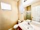 Bathroom features single sink vanity with a shower over tub at 3542 Harbor Tides St, Las Vegas, NV 89147