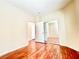 Bright bedroom featuring closet with sliding doors, and laminate wood flooring at 3542 Harbor Tides St, Las Vegas, NV 89147
