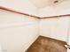 Walk-in closet featuring a wooden hanging rack and carpet flooring at 3542 Harbor Tides St, Las Vegas, NV 89147