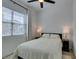A cozy bedroom with natural light, simple decor, and a comfortable bed is a perfect retreat at 365 Malpaso St, Las Vegas, NV 89138