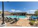 Community pool with inviting lounge chairs and tables, perfect for relaxation and social gatherings at 365 Malpaso St, Las Vegas, NV 89138