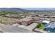 Bird's eye view of a residential house, illustrating the roof design, landscaping, and neighborhood layout at 420 Dakar St, Henderson, NV 89015