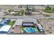 Aerial view of backyard with a pool, upstairs patio and a large gravel area fenced in at 420 Dakar St, Henderson, NV 89015