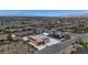 Aerial view showcases the large two-story house in a neighborhood with mountain views in the distance at 420 Dakar St, Henderson, NV 89015