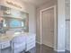 Modern bathroom featuring vanity with makeup mirror and a separate door at 420 Dakar St, Henderson, NV 89015