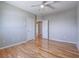 Neutral bedroom with hardwood floors and doors leading to the entryway at 420 Dakar St, Henderson, NV 89015