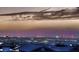 Picturesque skyline view at twilight showcases the city lights and distant mountains at 420 Dakar St, Henderson, NV 89015