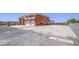 Expansive view of the terracotta house showing the large parking area, gated access, and spacious surroundings at 420 Dakar St, Henderson, NV 89015