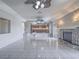 Open-concept living area featuring tile floors, a fireplace, and a seamless transition to the gourmet kitchen at 420 Dakar St, Henderson, NV 89015