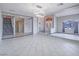 Open living space showcasing tile flooring, modern lighting, and a staircase at 420 Dakar St, Henderson, NV 89015