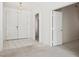 Home entryway with tiled flooring, double doors, and an open doorway at 4323 Village Spring St, Las Vegas, NV 89147