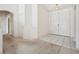 Welcoming foyer with a combination of carpet and tile flooring at 4323 Village Spring St, Las Vegas, NV 89147