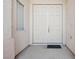 Inviting double front doors, creating a grand entrance to this lovely home at 4323 Village Spring St, Las Vegas, NV 89147
