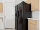 Close up view of the kitchen appliances and door at 4323 Village Spring St, Las Vegas, NV 89147