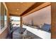 Backyard covered patio with brick pavers, retaining wall and plenty of room at 462 Fortissimo St, Henderson, NV 89011
