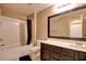 Well-lit bathroom with a shower-tub combo and modern vanity with plenty of storage at 462 Fortissimo St, Henderson, NV 89011