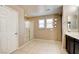 Bathroom showcasing a glass door shower and vanity with a sink and mirror at 462 Fortissimo St, Henderson, NV 89011