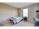 Neutral bedroom with carpeted floor, blinds on window, closet, and desk at 462 Fortissimo St, Henderson, NV 89011