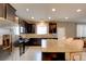 Modern kitchen featuring stainless steel appliances, a large island, and sleek cabinets at 462 Fortissimo St, Henderson, NV 89011