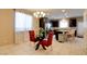 Open kitchen and dining area featuring modern appliances and comfortable seating at 462 Fortissimo St, Henderson, NV 89011