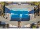 Aerial view of a large, inviting community pool with ample lounge chairs for residents to relax and enjoy at 462 Fortissimo St, Henderson, NV 89011
