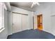 Bedroom with ceiling fan, a window, and closet space at 504 Arthur Ave, Henderson, NV 89015