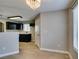 Dining area next to the kitchen has pendant lighting and views of the backyard at 698 S Racetrack Rd # 114, Henderson, NV 89015