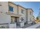 Charming two-story home with tan stucco, covered front porch, and well-maintained landscaping at 762 Star Estates Ave # 0, North Las Vegas, NV 89086